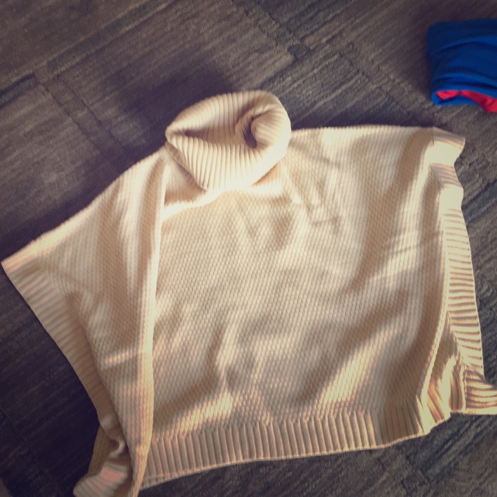 Women cream poncho
